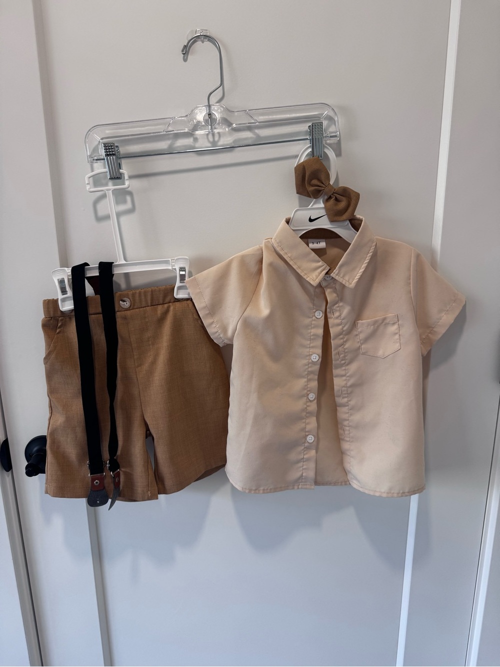 Nike Kids Beige Button-Up Shirt with Tan Shorts and Bow